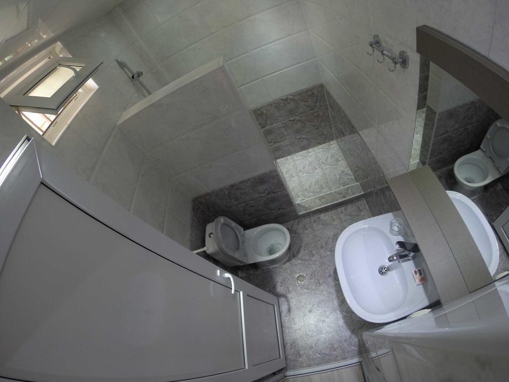 Guest House Rampa Тбилиси Стая снимка